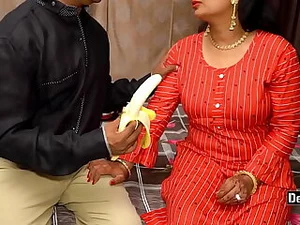 Indian slut craves banana in steamy tit fuck video