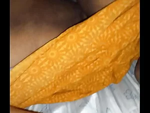 Indian aunt S. teases and seduces in Telugu video.
