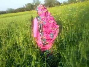 Indian wife and gardener outdoors
