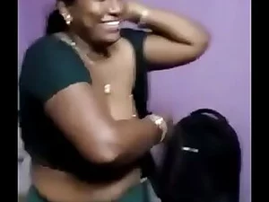 A desperate Tamil aunty seeks help from a neighbor, leading to a steamy encounter. She pleads for a raid on her backdoor, igniting a wild, intense session of bukkake.