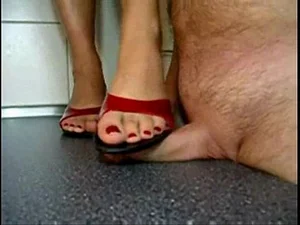 Disappointed Indian wife humiliates her husband's inadequate penis with her feet
