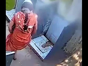 Indian wife pees near open space with courage