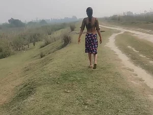 Desi girl talks dirty and fucks on a green hill.