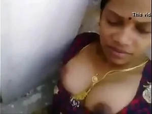 Tamil aunty gets naughty in a hot sex scene, showcasing her skills.